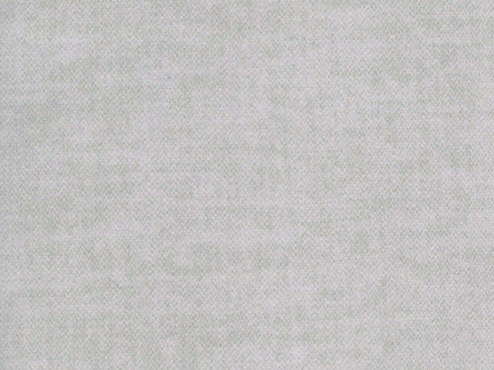 Pale cool-grey velvet with fine woven texture and softly mottled tonal shading