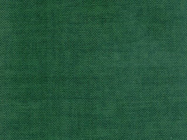 Deep forest-green velvet with subtle nap shading and a close textured surface