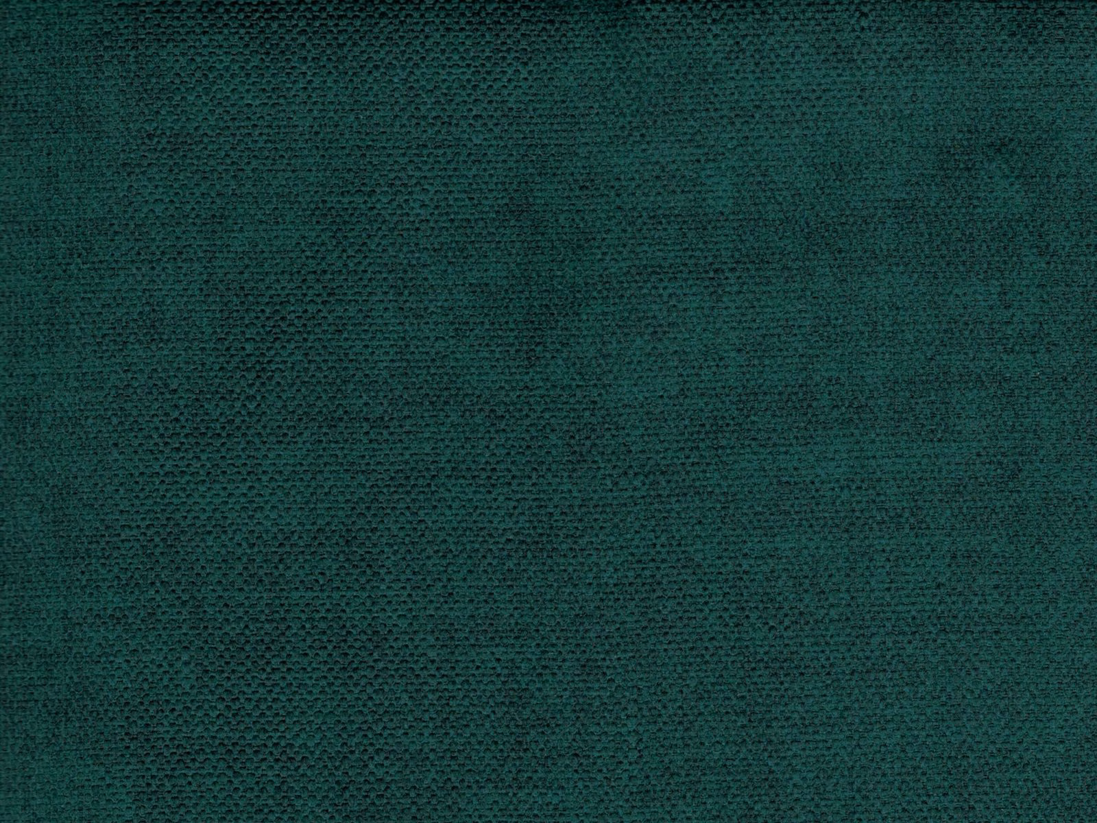 Close-up of deep teal velvet with fine mottled weave and subtle nap highlights