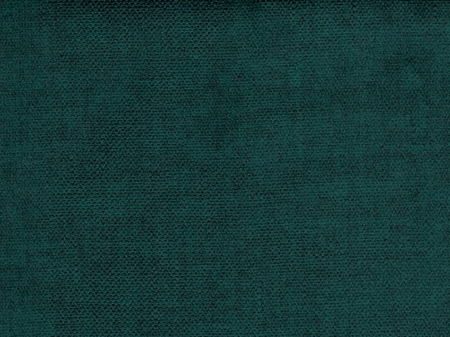 Close-up of deep teal velvet with fine mottled weave and subtle nap highlights