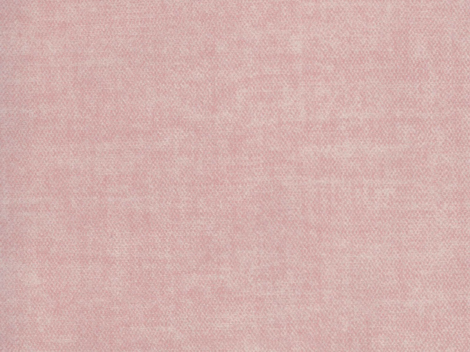 Soft blush pink velvet with a subtle mottled texture and gently shifting nap