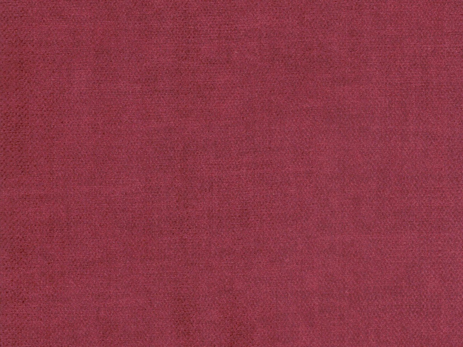 Deep berry-red velvet swatch with subtle tonal texture and light-catching pile