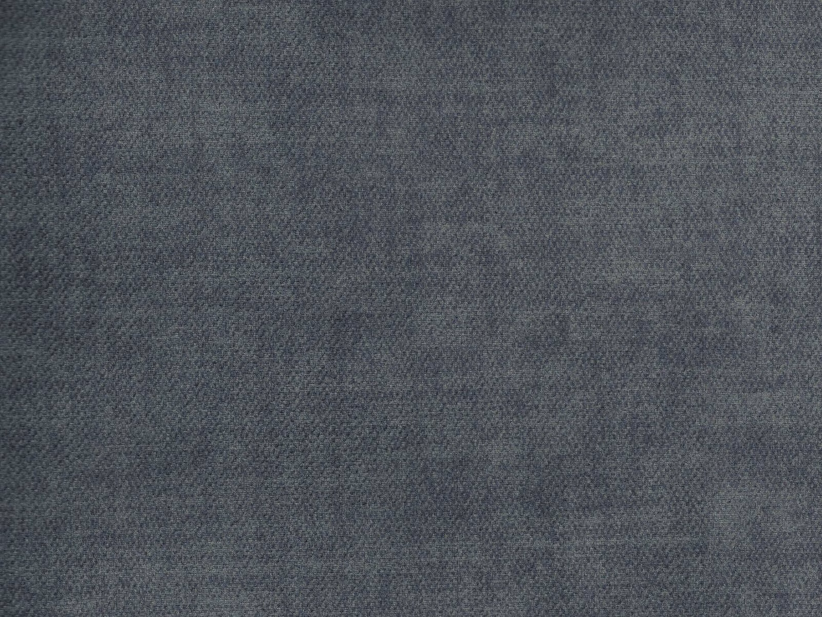 Close view of charcoal blue-grey velvet with a softly mottled, low-contrast nap