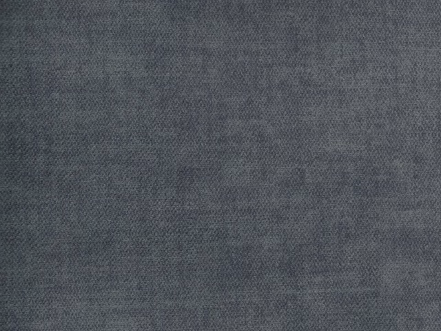 Close view of charcoal blue-grey velvet with a softly mottled, low-contrast nap
