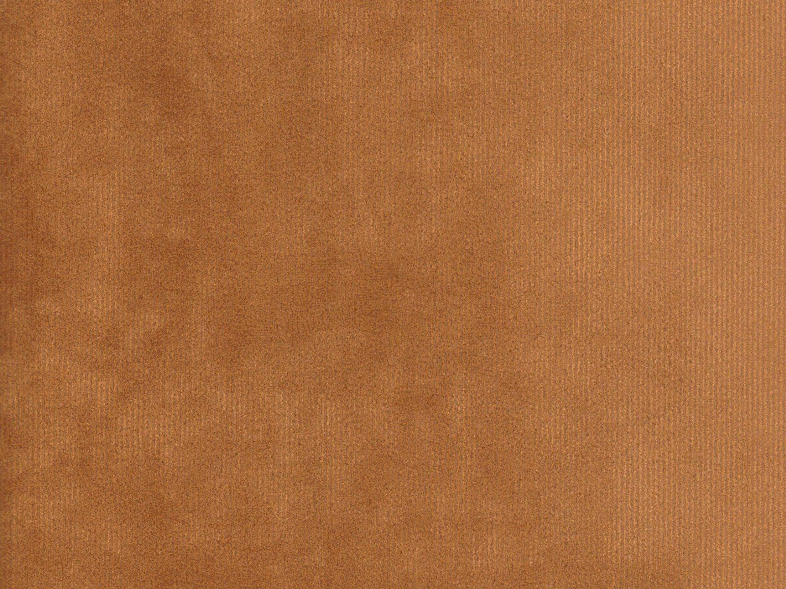 Warm cognac-brown velvet swatch showing fine vertical pile and soft tonal shading