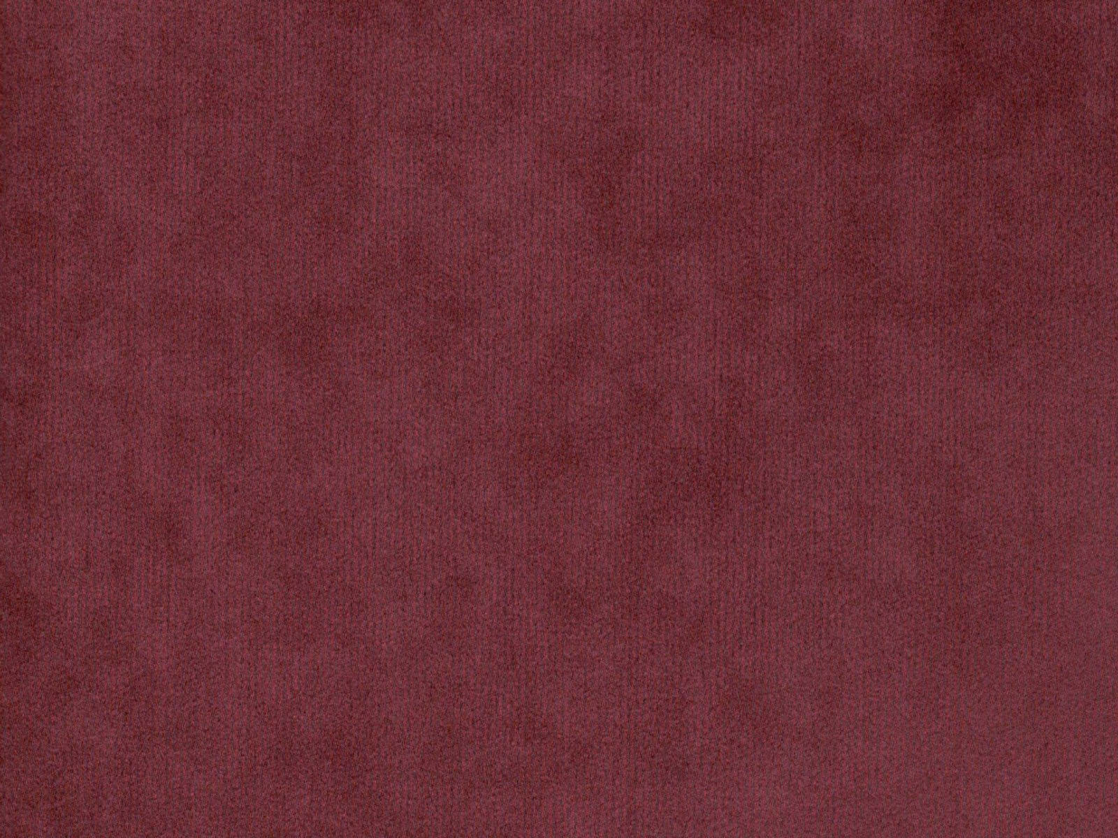 Deep burgundy velvet with softly mottled nap and subtle tonal sheen