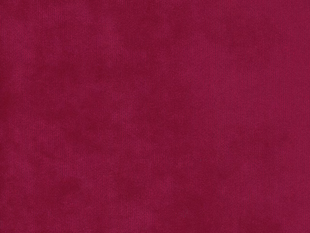Deep magenta velvet showing a softly shifting plain pile and darker wine-toned shading