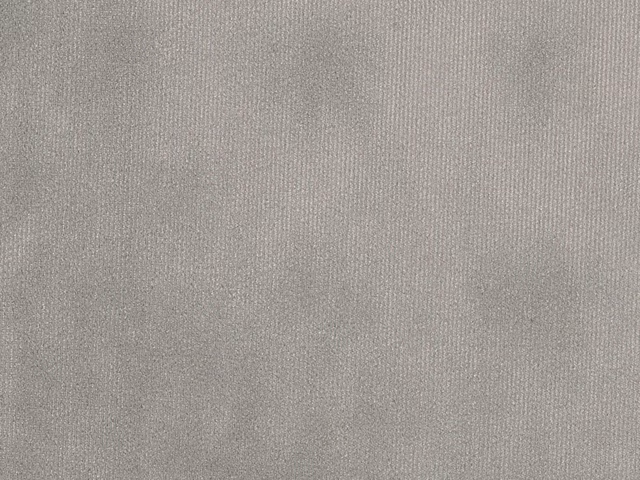 Close-up of soft taupe-grey velvet with fine pile and subtle silvery shading
