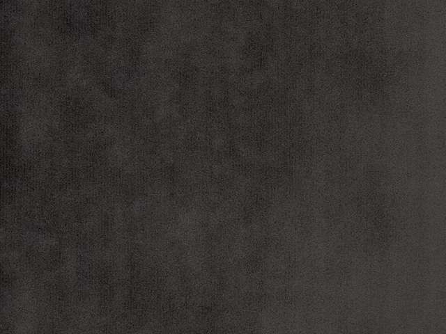 Deep charcoal-grey velvet swatch showing subtle nap shifts across its plain surface