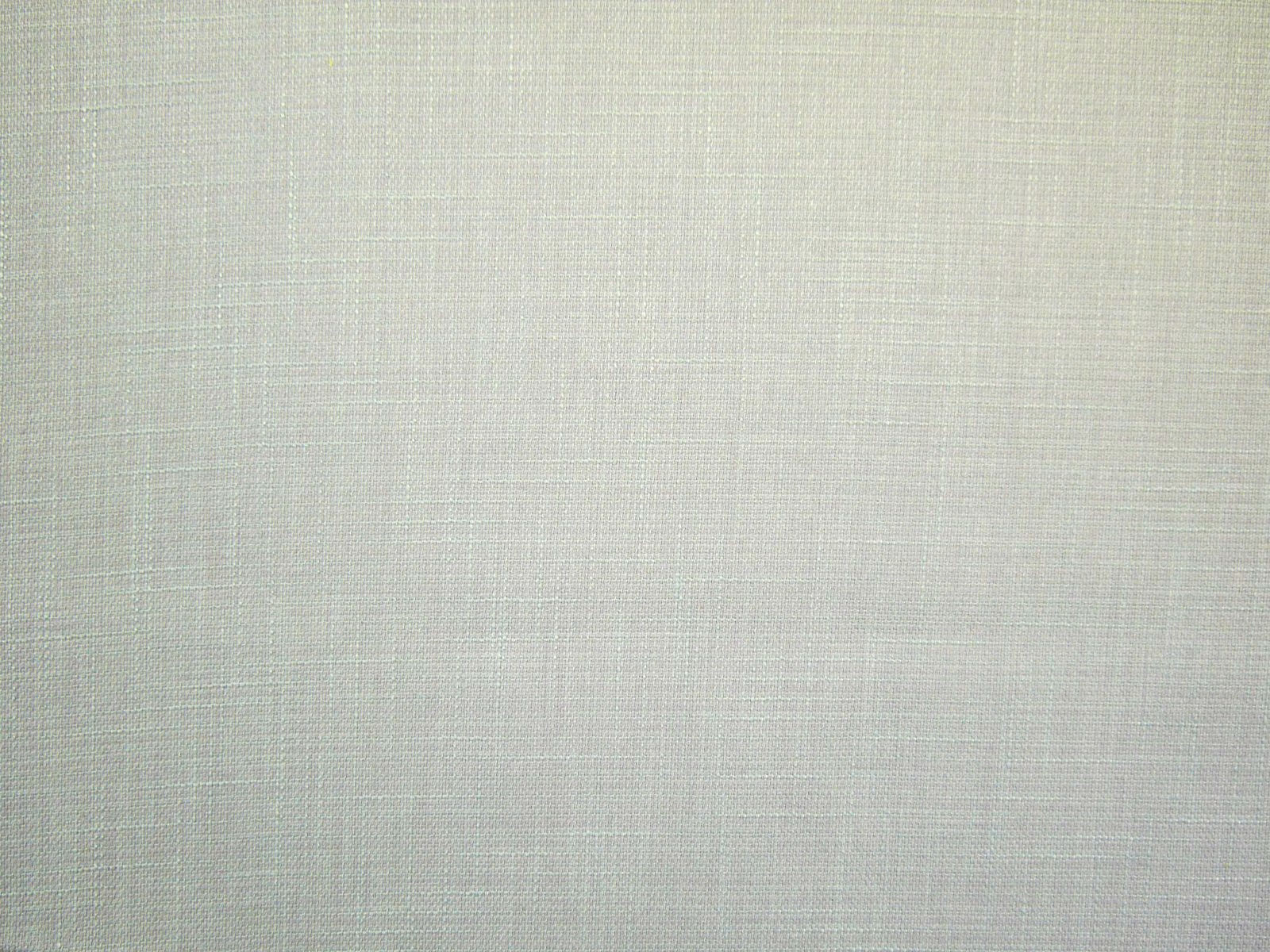 Pale sage-grey faux linen showing a fine, subtly crosshatched woven texture