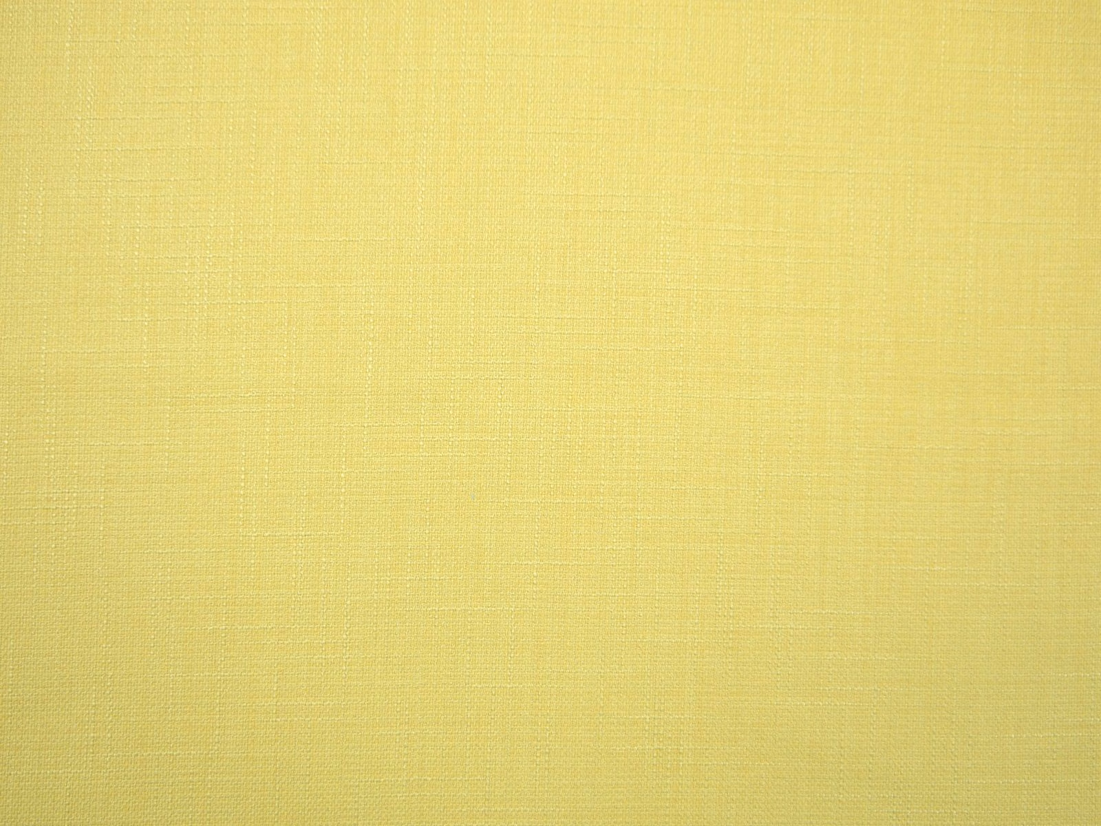 Soft chartreuse-yellow faux linen with a fine, subtly textured woven surface