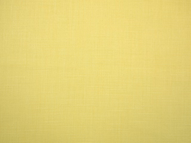 Soft chartreuse-yellow faux linen with a fine, subtly textured woven surface