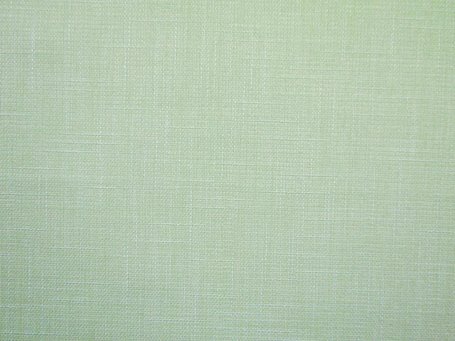 Pale mint-green faux linen with a fine crosshatched woven texture