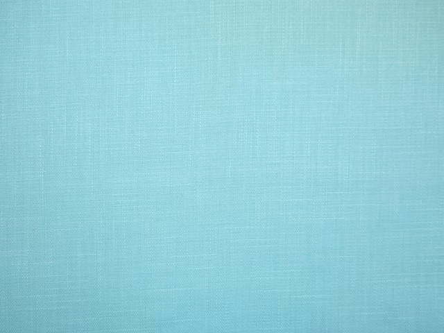 Pale aqua-teal faux linen with a fine crosshatched woven surface