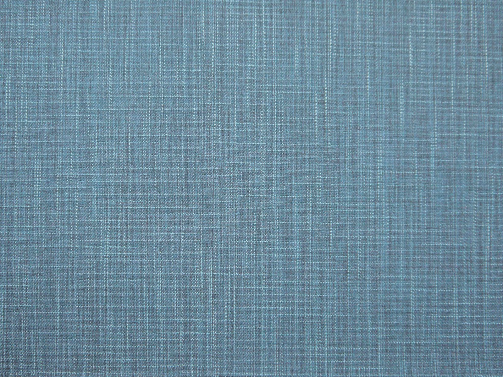 Muted blue-teal faux linen with fine crosshatched woven texture and subtle grey variation