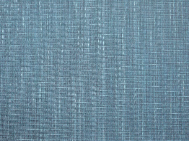 Muted blue-teal faux linen with fine crosshatched woven texture and subtle grey variation