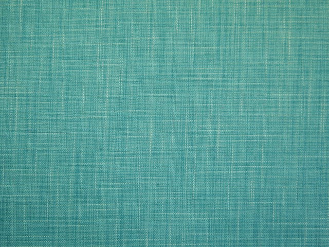 Muted turquoise teal faux-linen swatch with fine crosshatched woven texture