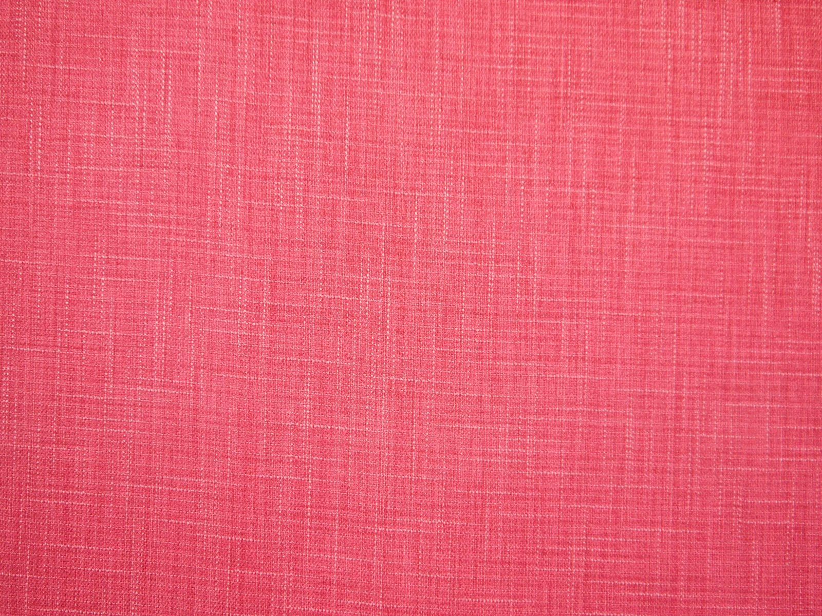 Vivid raspberry pink faux-linen weave with subtle crosshatched slub texture