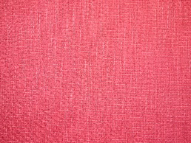Vivid raspberry pink faux-linen weave with subtle crosshatched slub texture