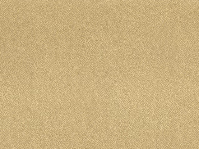 Warm sandy-beige faux leather with a fine, softly mottled grain texture