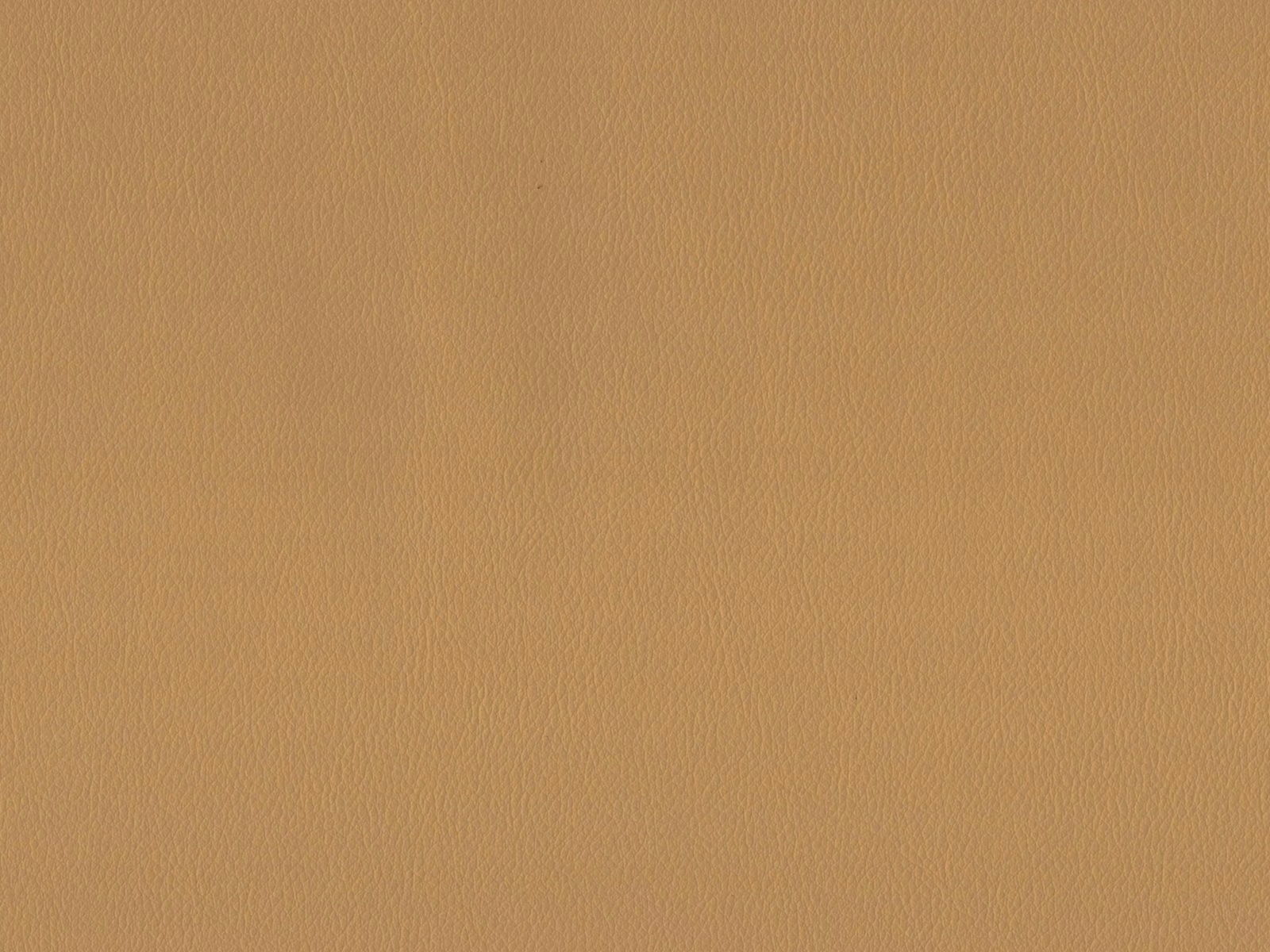 Warm camel-tan faux leather swatch showing a fine, even pebbled grain