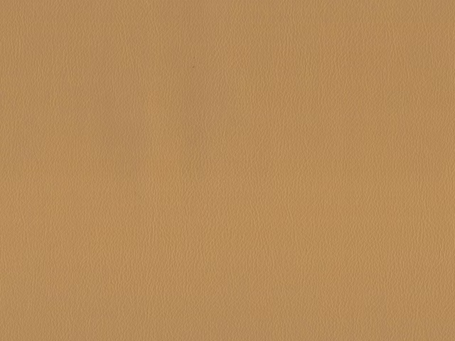 Warm camel-tan faux leather swatch showing a fine, even pebbled grain