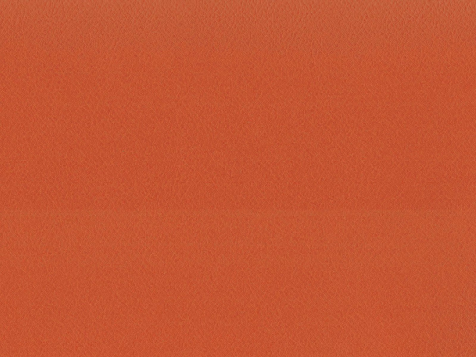 Warm terracotta faux leather with a fine, subtly pebbled grain