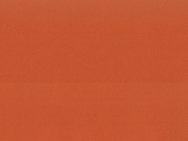 Warm terracotta faux leather with a fine, subtly pebbled grain