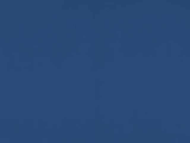 Deep navy blue faux leather with a subtle fine-grained surface