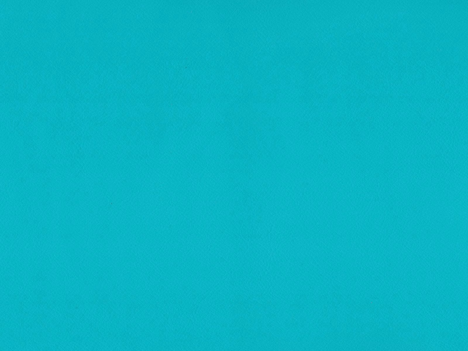 Bright turquoise teal faux leather with a subtly mottled, smooth grain
