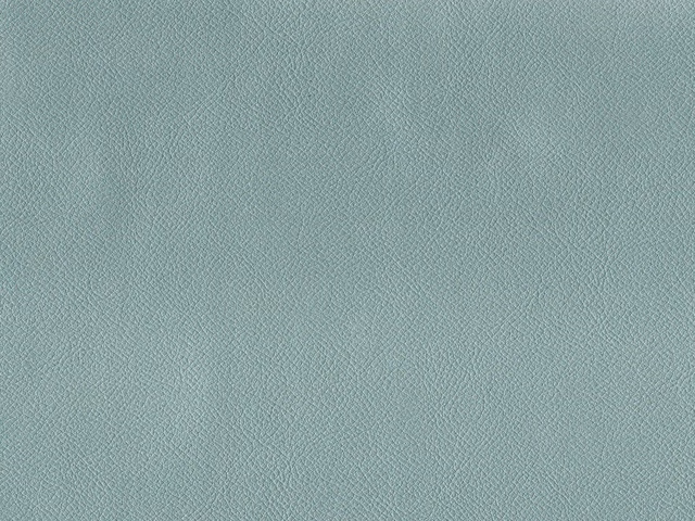 Muted seafoam teal faux leather showing a fine, even pebbled grain