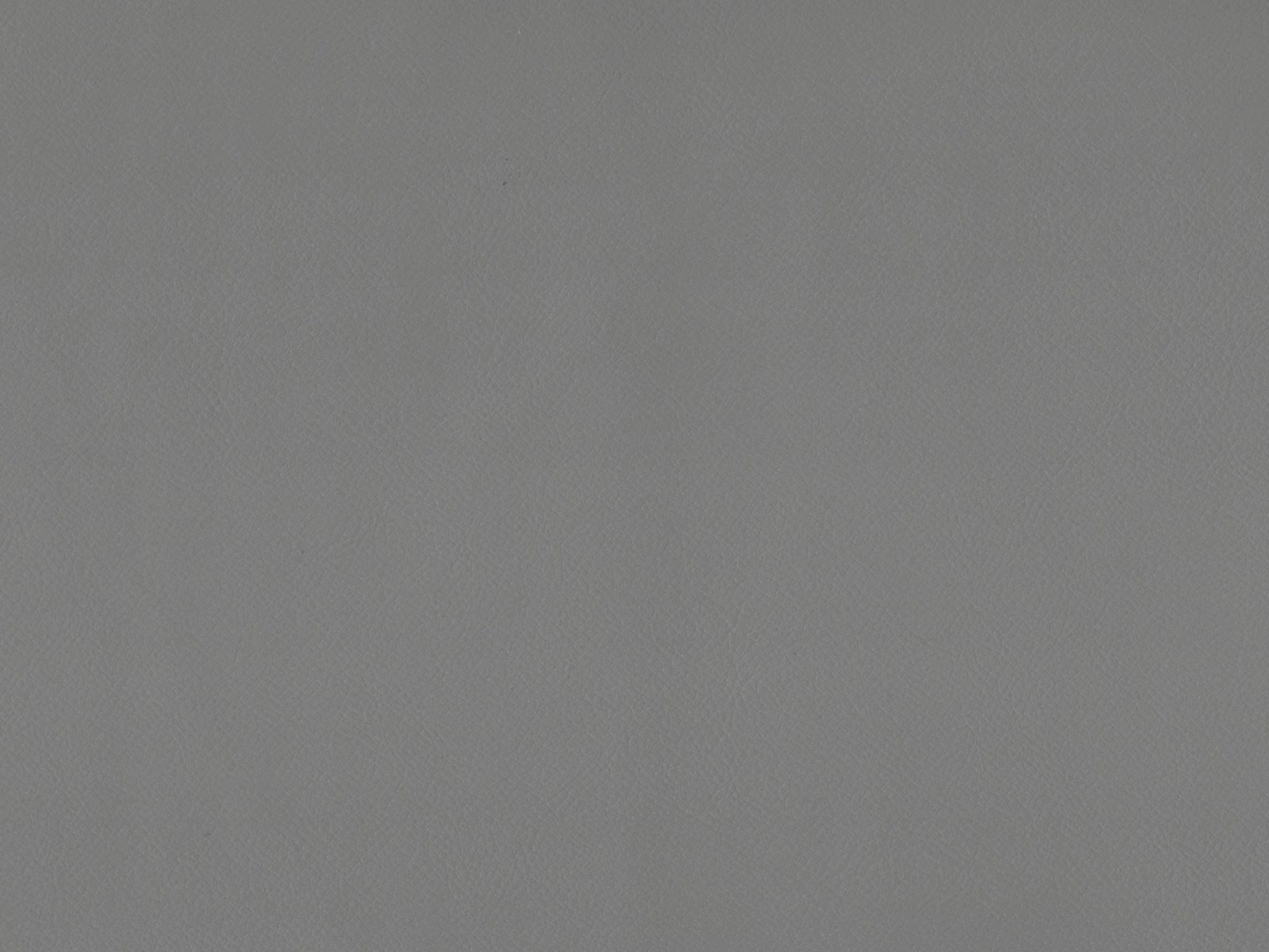 Cool mid-grey faux leather swatch showing a fine, even grain