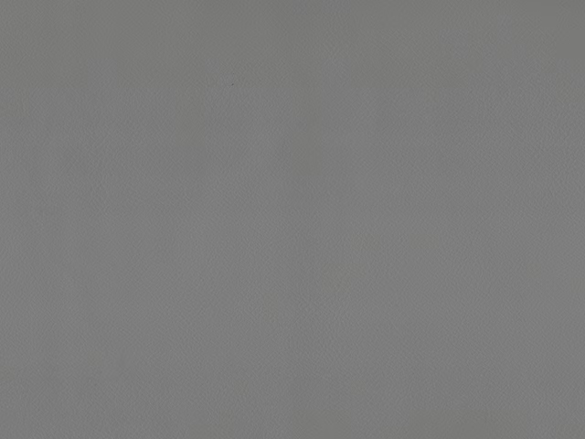 Cool mid-grey faux leather swatch showing a fine, even grain