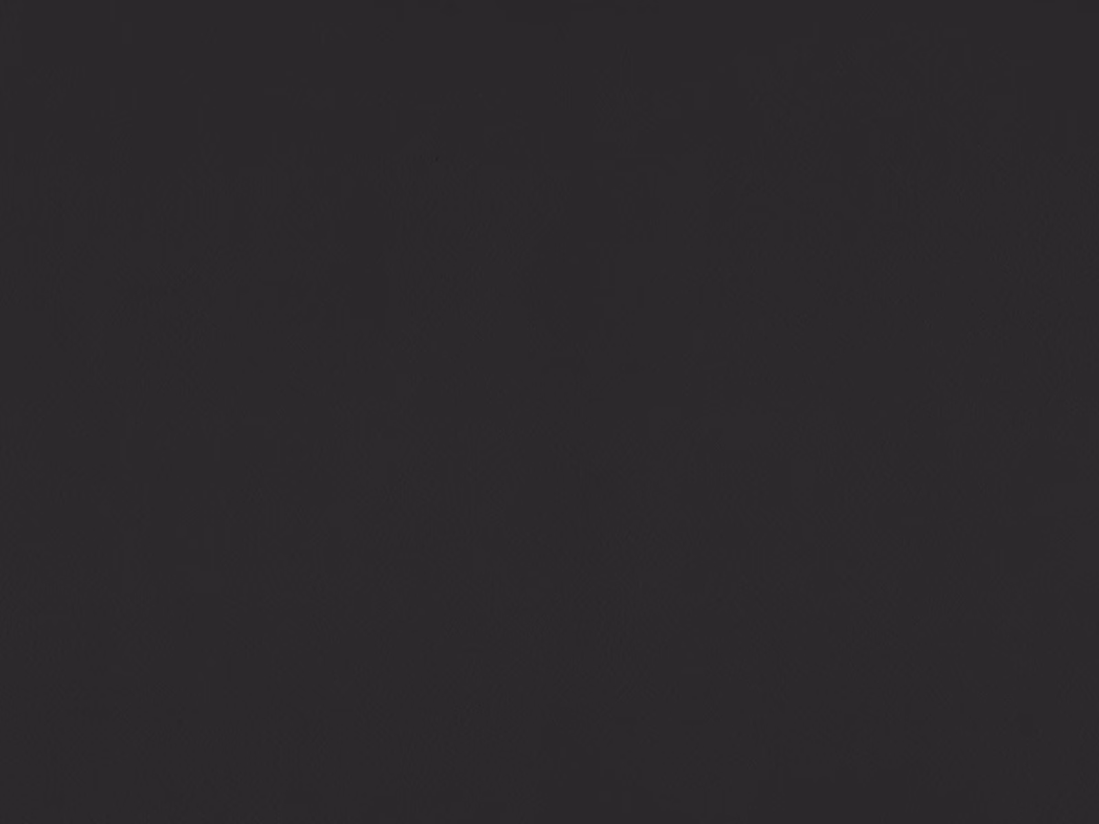 Deep charcoal-black faux leather swatch with a smooth, subtly low-sheen surface