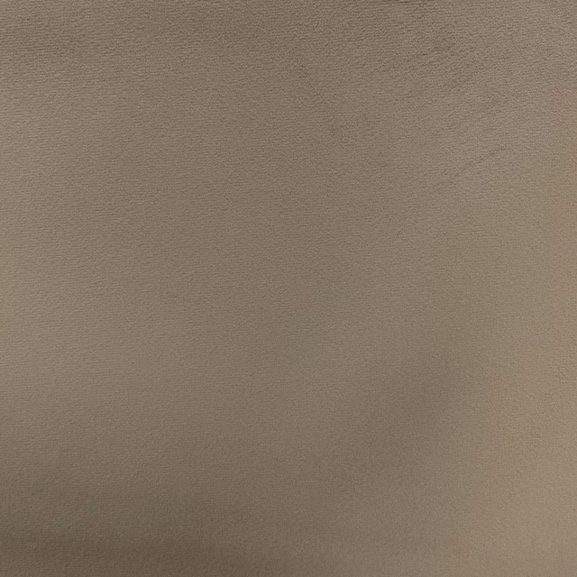 Warm taupe-grey velvet showing a fine, softly directional pile