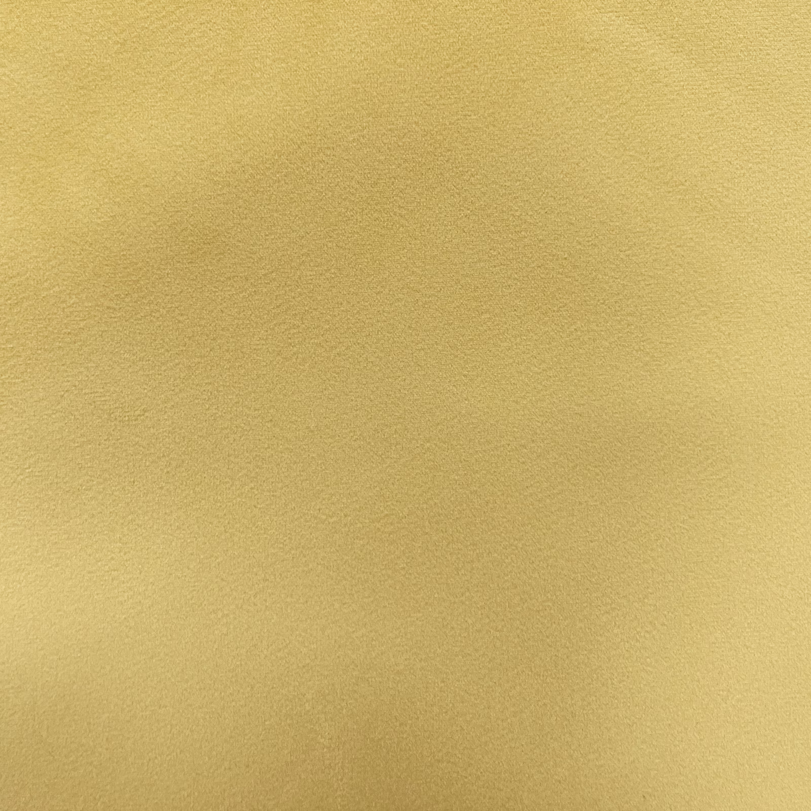 Muted golden yellow velvet swatch showing a softly shaded, fine plush pile