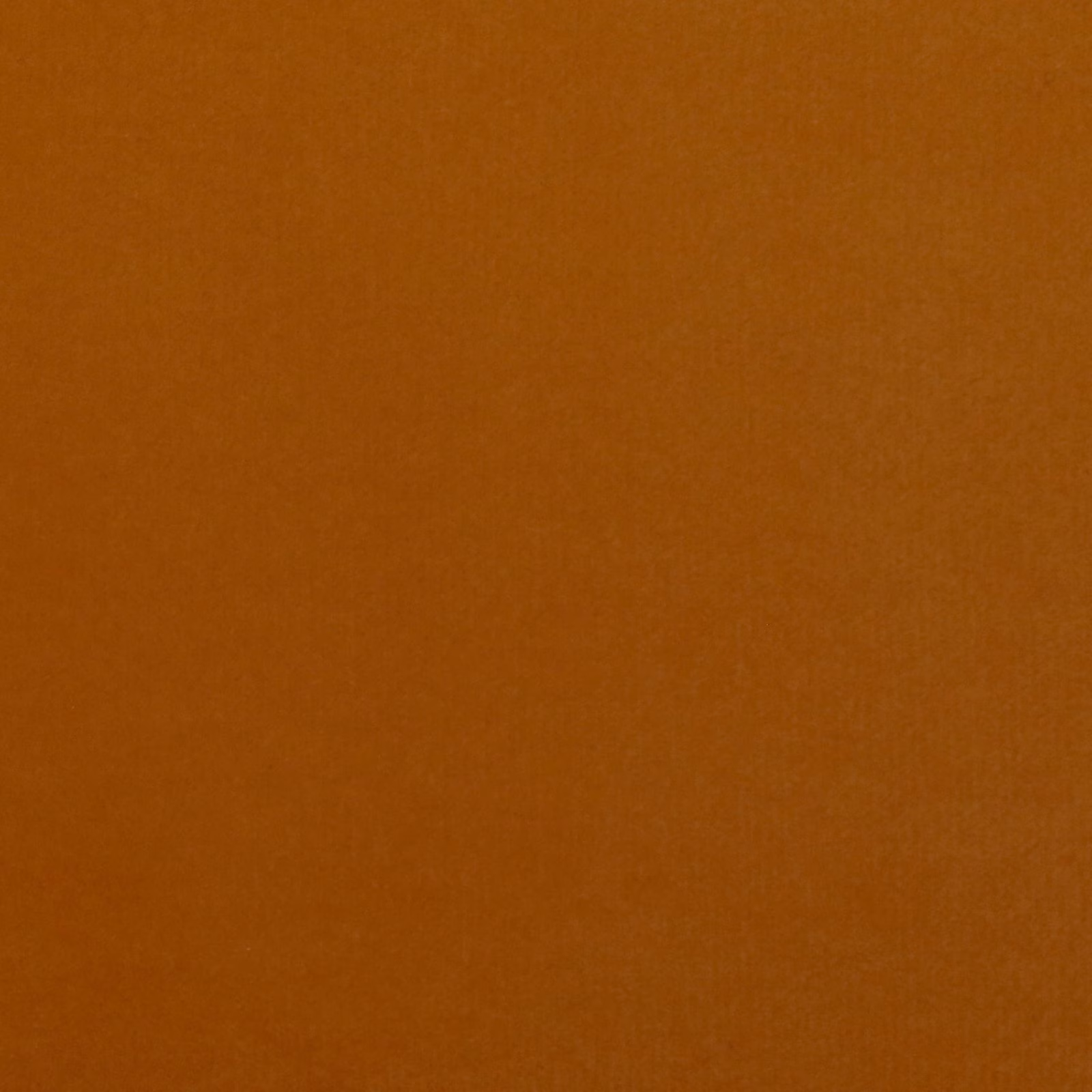 Deep burnt-orange velvet swatch showing a softly shaded, close-cut pile