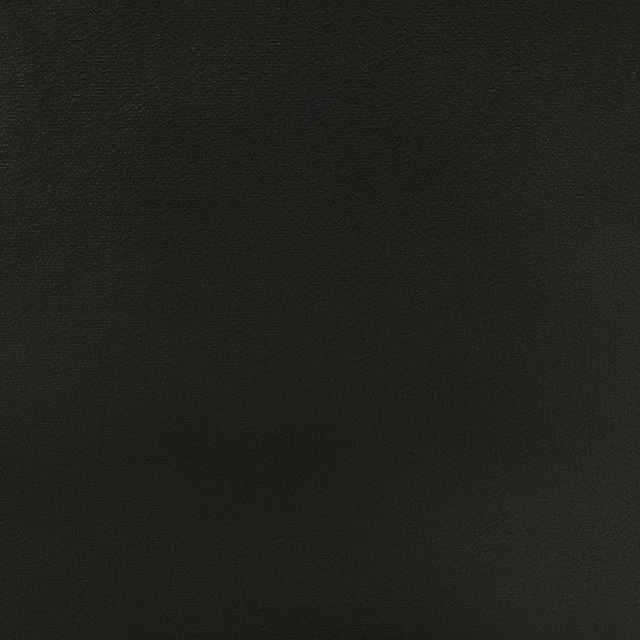 Near-black charcoal velvet with a subtle directional nap and softly changing sheen