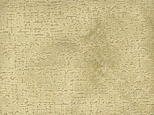 Muted olive-beige velvet with broken horizontal texture and softly shaded depth
