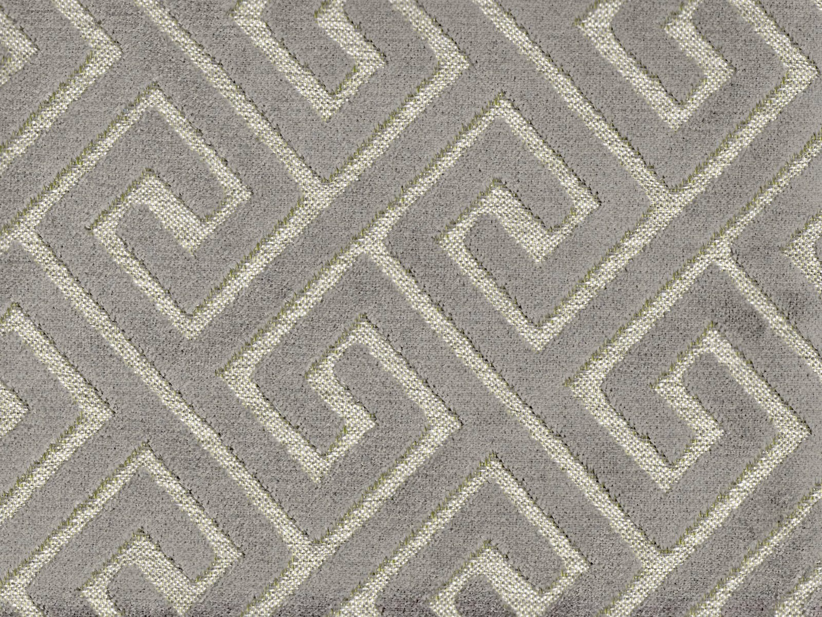 Stone-taupe velvet with pale interlocking geometric maze lines and softly mottled texture