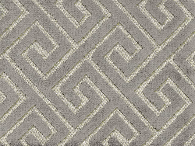Stone-taupe velvet with pale interlocking geometric maze lines and softly mottled texture