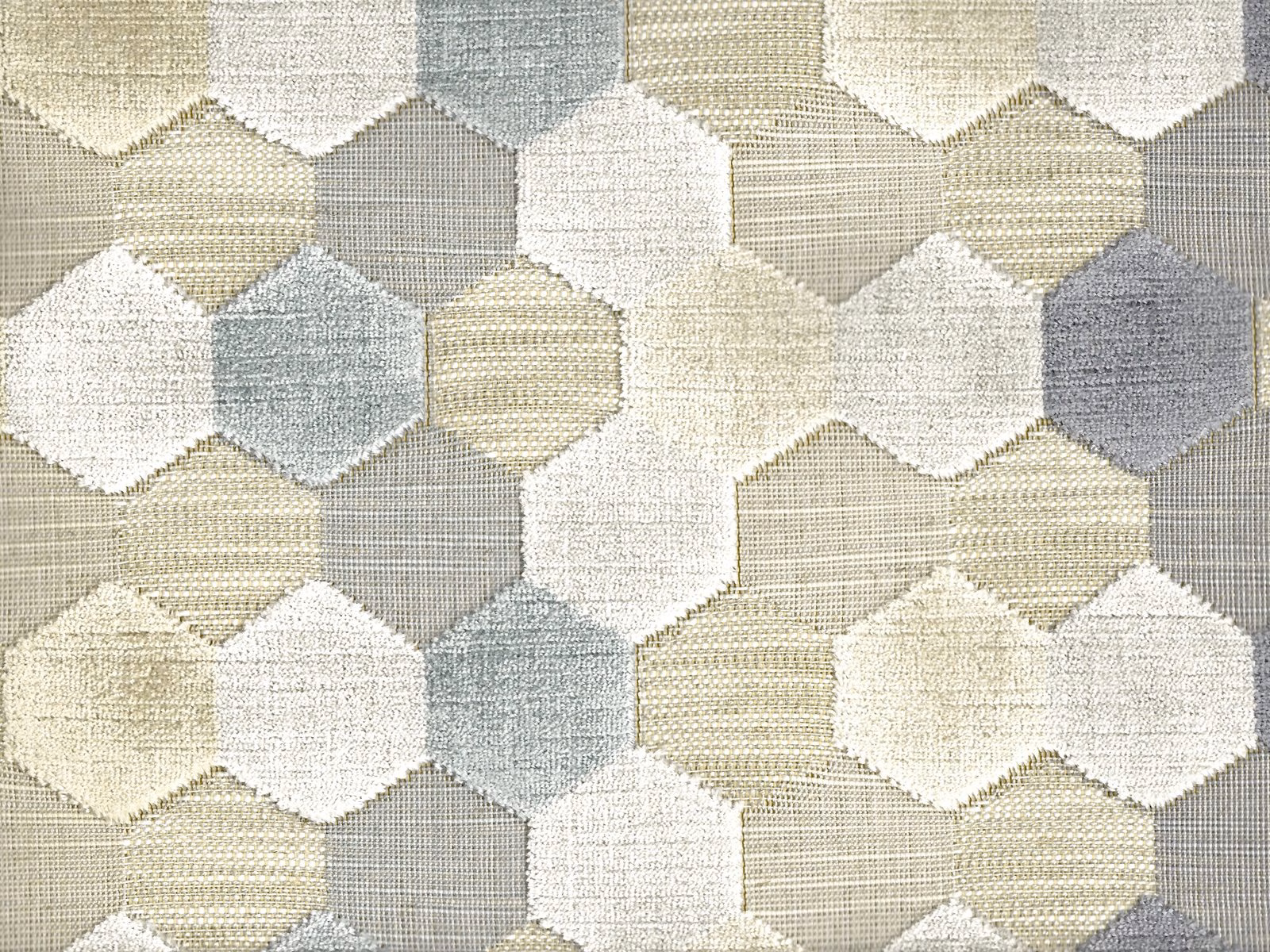 Pale cream, sage-grey and taupe interlocking hexagons with textured velvet surface