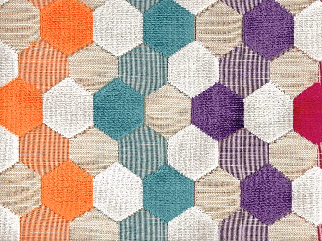 Orange, teal, purple and cream hexagons on textured multicoloured velvet