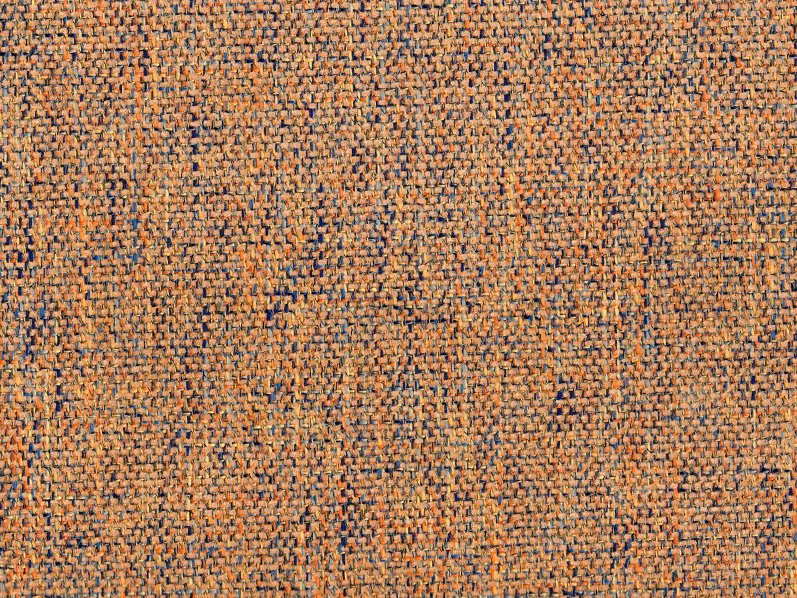 Terracotta chenille with tan, charcoal and blue flecks in a nubby woven texture