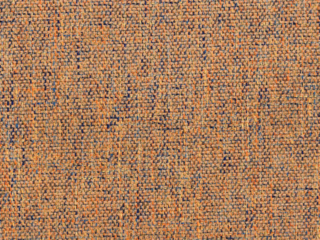 Terracotta chenille with tan, charcoal and blue flecks in a nubby woven texture