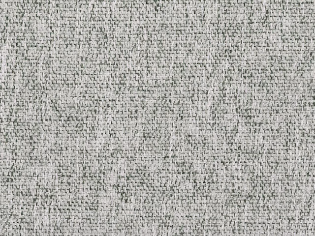 Pale silver-grey chenille with fine charcoal flecks and a softly nubby woven texture