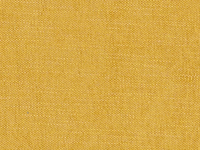 Close-up of warm mustard-gold chenille with a fine, softly mottled woven texture