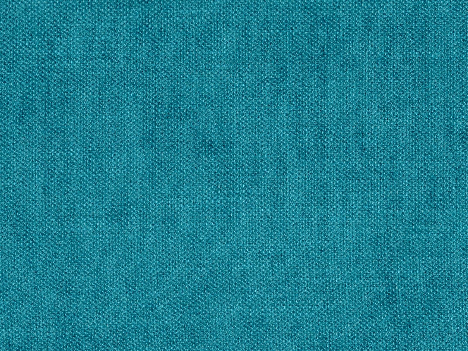 Close-up of blue-green teal chenille with a fine, softly mottled woven texture