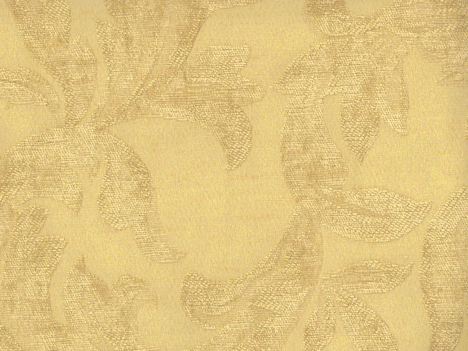 Pale gold chenille with large tonal botanical leaves and a softly raised weave