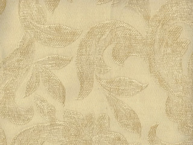Warm ivory chenille with champagne paisley leaves and softly textured scrolling motifs